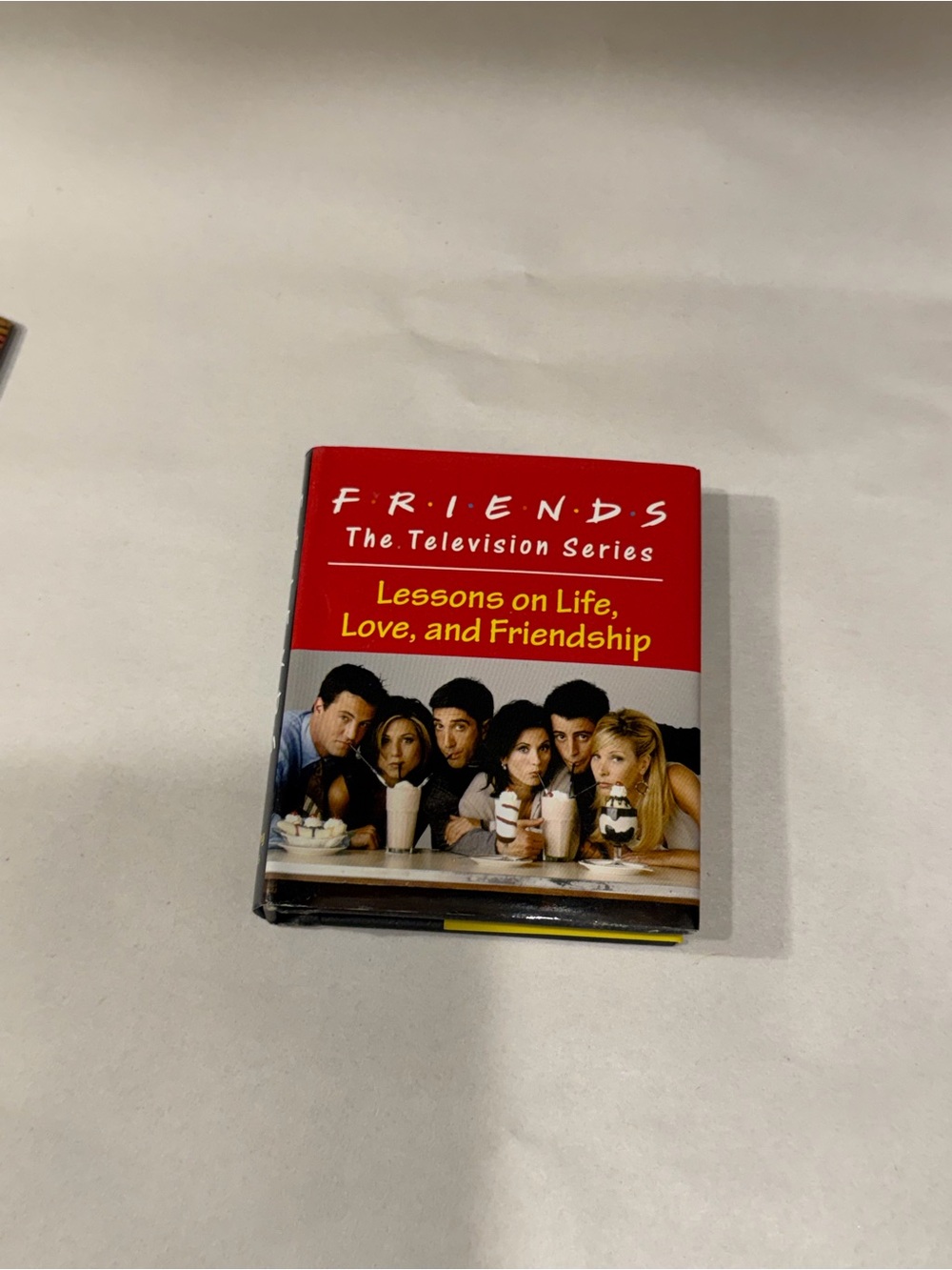 FRIENDS TV Series Mini Book with Yellow Cover and Multicolor Photo